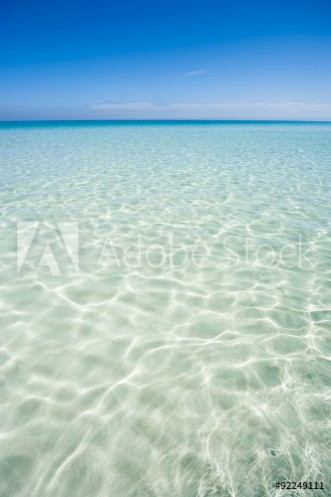 Picture of Shore of classic turquoise Caribbean Sea dream beach under bright blue sky near the resort town of Varadero Cuba